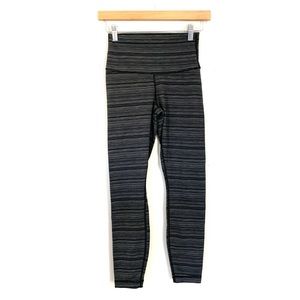 Grey and black striped Lululemon crops